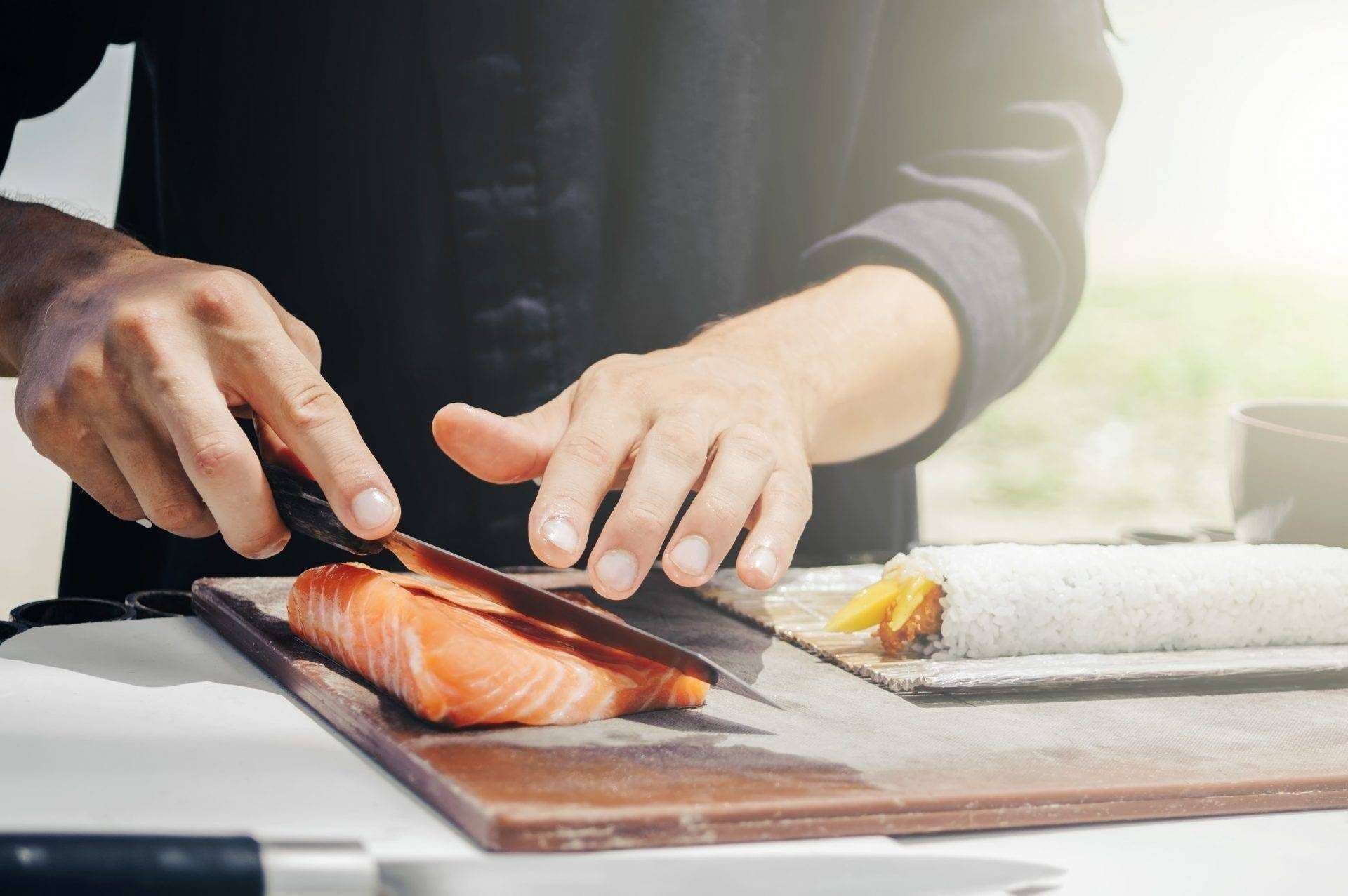 Chef cook making sushi Chef cook making sushi outdoor